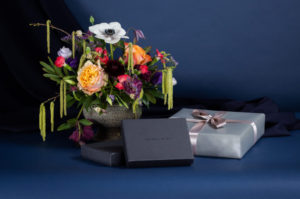 Bouquet of Flowers surrounded by Maxwell Scott Gift Boxes