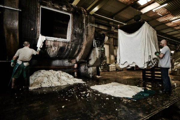 Italian leather production using natural chestnut extract tanning vats