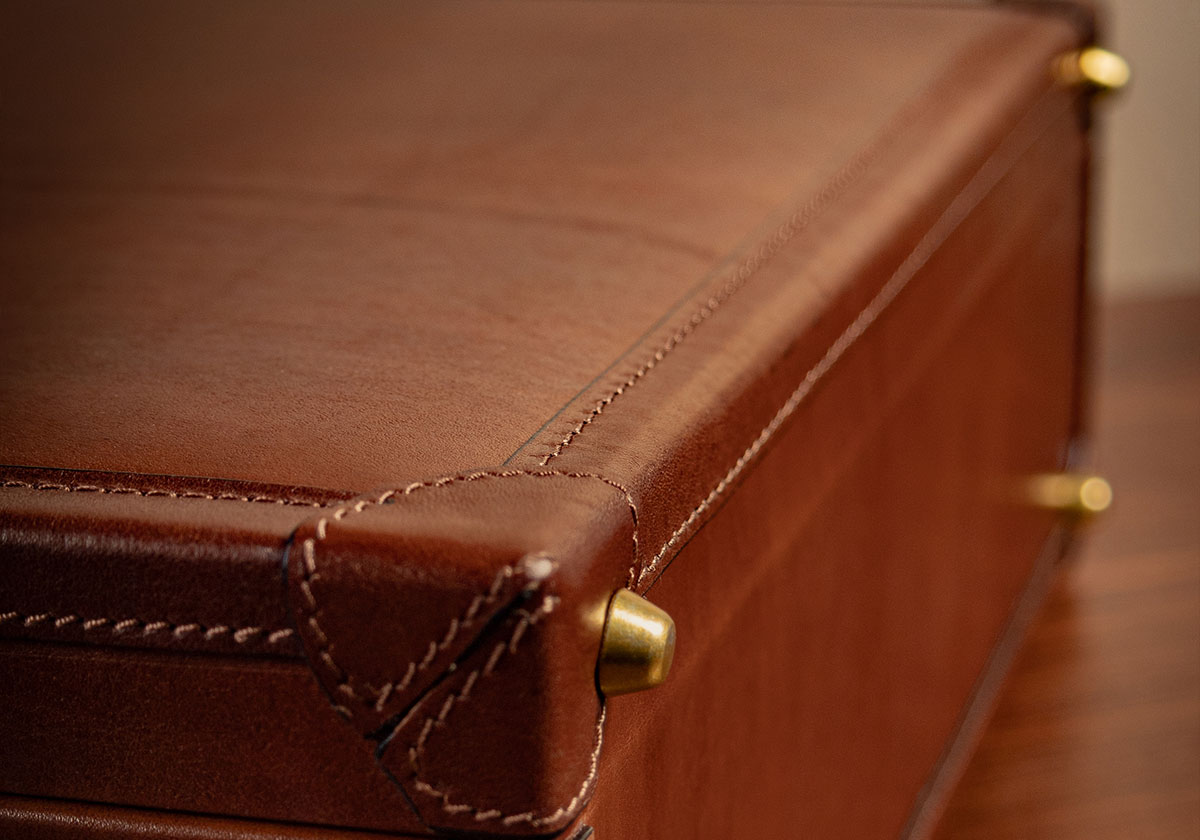 Traditional attaché briefcase with metal studs