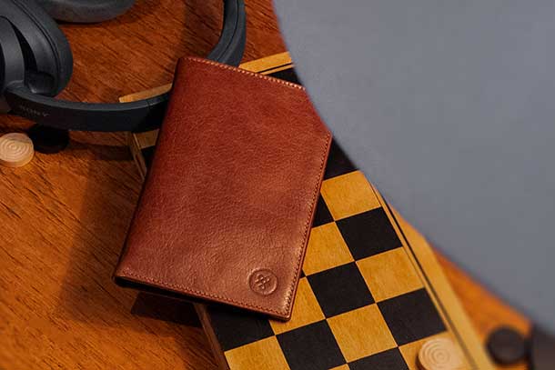 best quality mens tall leather RFID wallet sat on chessboard