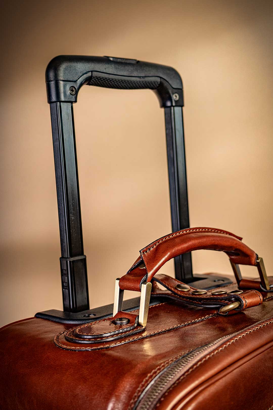pull out handles from luxury italian leather trolley case