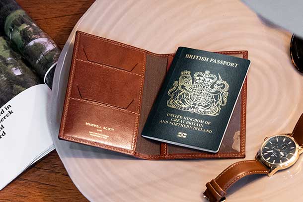 quality mens leather RFID passport wallet sat on desk