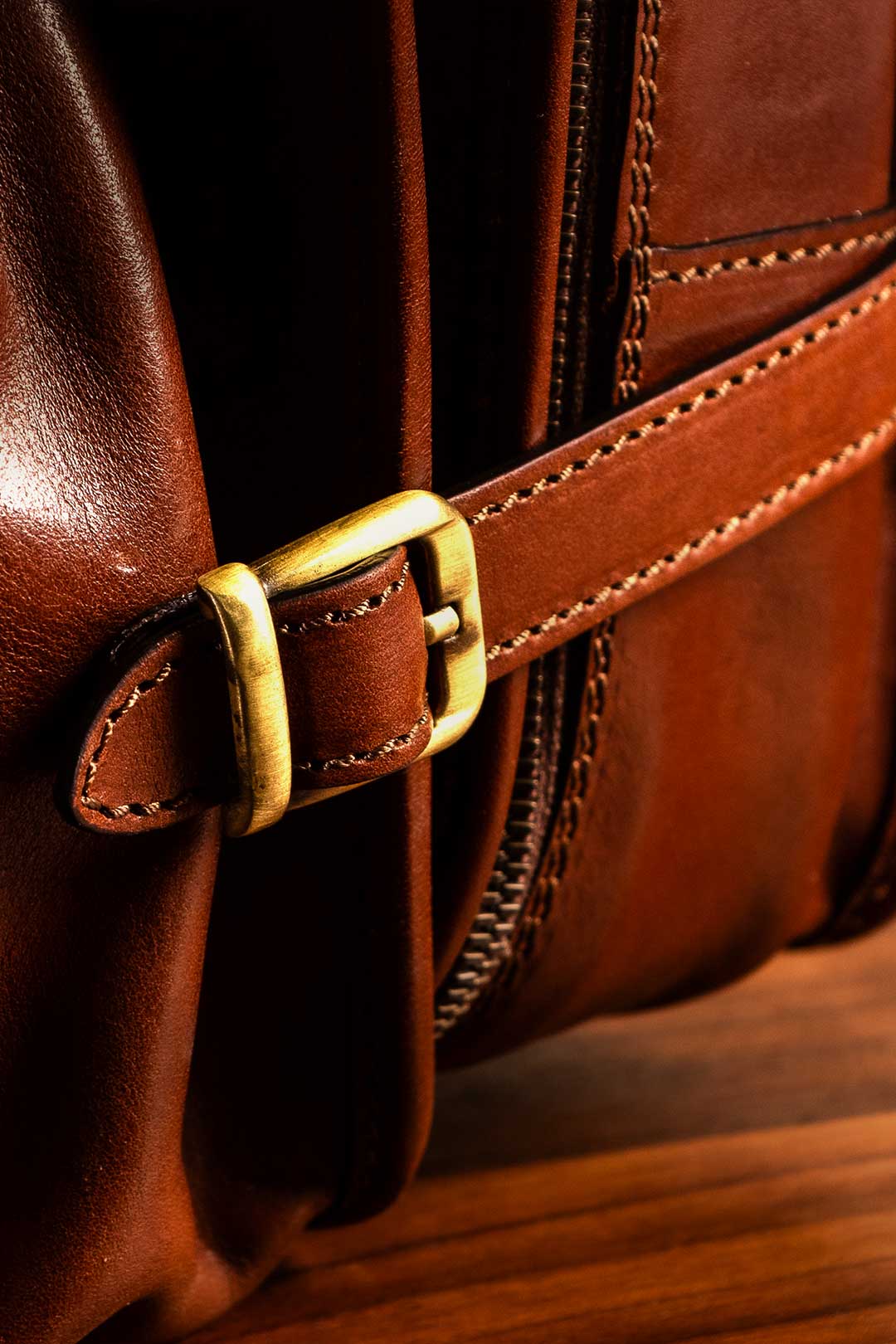 straps from luxury italian leather suit carrier
