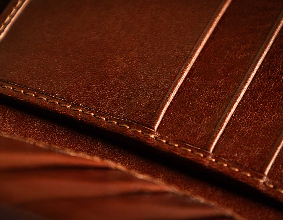 stitching on brown men's leather wallet