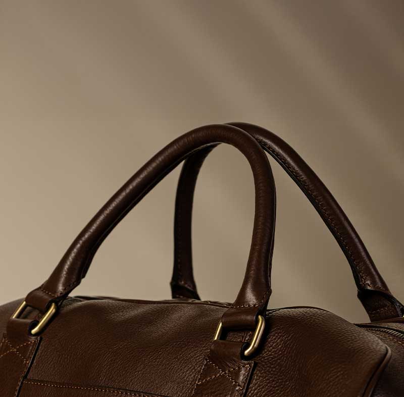 handles of leather luggage bag