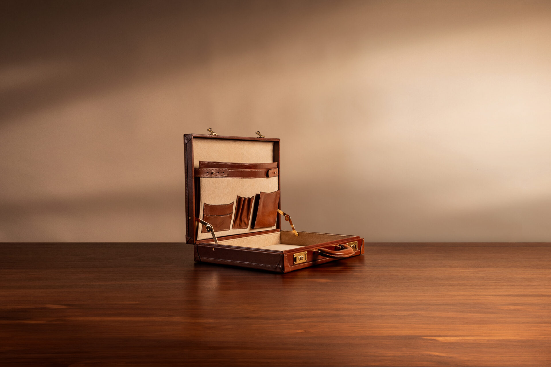 Structured leather attaché case with box-frame construction